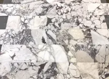 Prave mermerne plocice calacatta-viola Na slici se vide prave meremrne pločice u sivo-belim prelicima